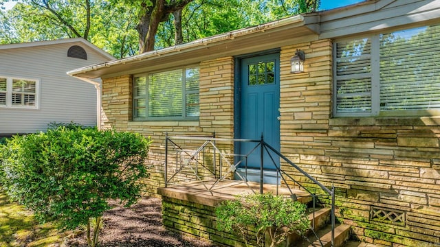 1118 Garland, North Little Rock, AR 72216 - doorway to property featuring brick siding