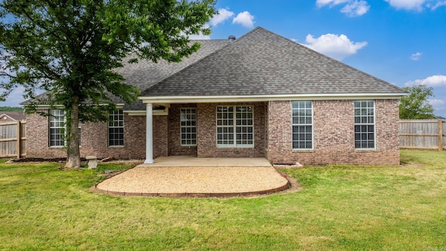 2340 Morning Glory, Conway, AR 72034 - back of property with a shingled roof and a patio area