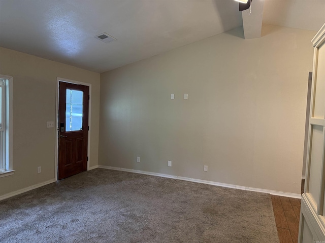 122 Meadow Cliff Cir, Fairfield Bay, AR 72088 - unfurnished room featuring baseboards, vaulted ceiling, and a ceiling fan