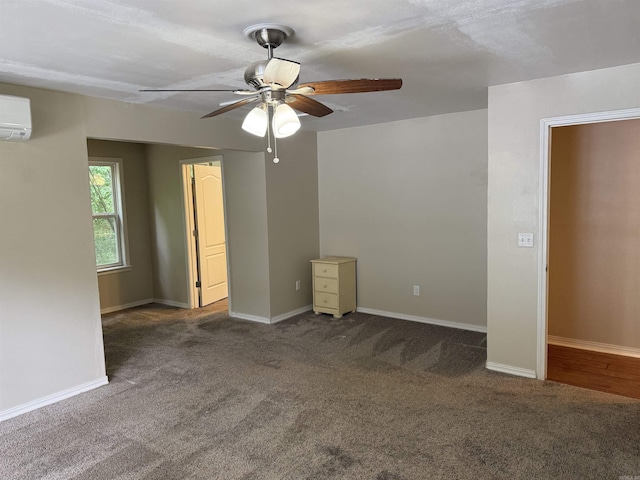 122 Meadow Cliff Cir, Fairfield Bay, AR 72088 - spare room featuring carpet flooring, a wall mounted air conditioner, a ceiling fan, and baseboards