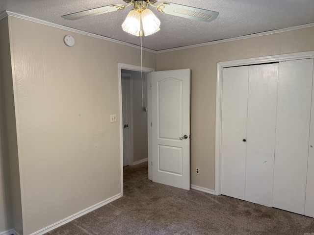 122 Meadow Cliff Cir, Fairfield Bay, AR 72088 - unfurnished bedroom with carpet flooring, a textured ceiling, ornamental molding, a closet, and a ceiling fan