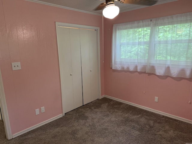 122 Meadow Cliff Cir, Fairfield Bay, AR 72088 - unfurnished bedroom featuring carpet floors, a closet, ornamental molding, baseboards, and ceiling fan