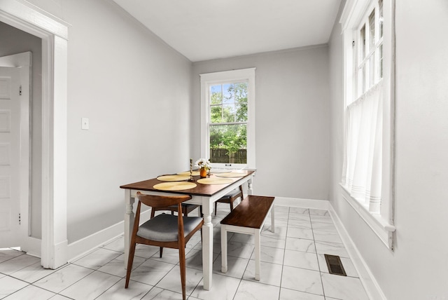 1905 S Battery St, Little Rock, AR 72202 - dining room with light marble finish flooring and baseboards