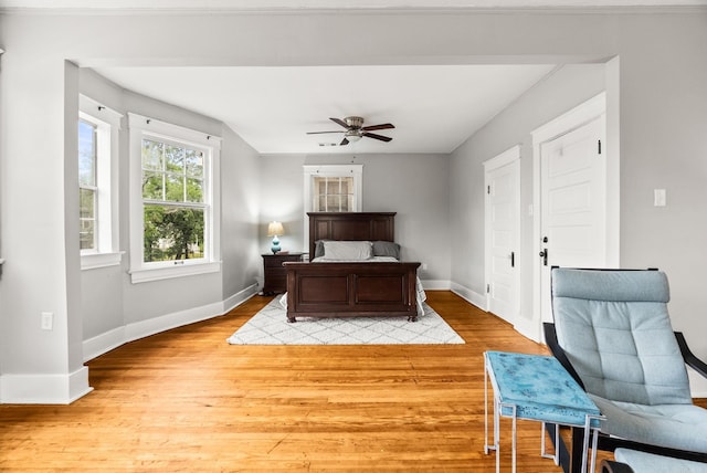 1905 S Battery St, Little Rock, AR 72202 - bedroom featuring light wood finished floors, baseboards, and a ceiling fan