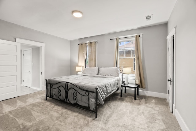 1905 S Battery St, Little Rock, AR 72202 - carpeted bedroom featuring baseboards