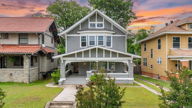 1905 S Battery St, Little Rock, AR 72202 - view of front of property with covered porch and a lawn