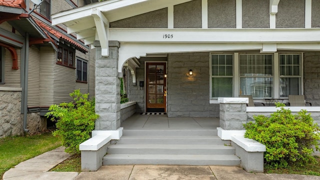 1905 S Battery St, Little Rock, AR 72202 - entrance to property featuring covered porch and stone siding