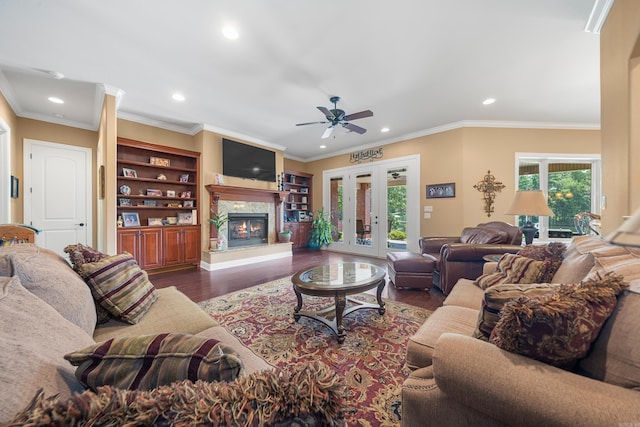 20 Stonegate, Hot Springs, AR 71913 - living area with recessed lighting, wood finished floors, crown molding, a glass covered fireplace, and a ceiling fan