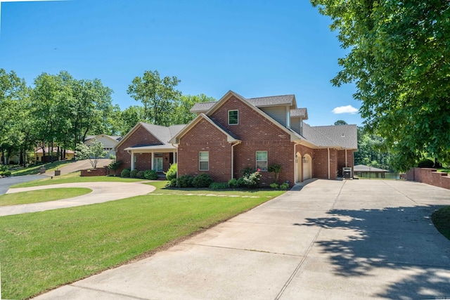20 Stonegate, Hot Springs, AR 71913 - traditional home featuring driveway, brick siding, a garage, a front yard, and roof with shingles