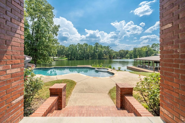 20 Stonegate, Hot Springs, AR 71913 - view of swimming pool with a water view, a patio area, and a pool with connected hot tub