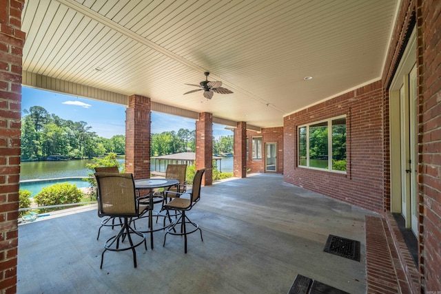 20 Stonegate, Hot Springs, AR 71913 - view of patio featuring a water view, ceiling fan, and outdoor dining space