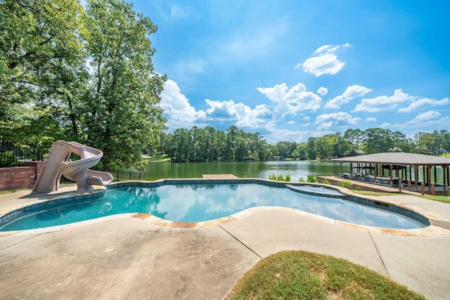 20 Stonegate, Hot Springs, AR 71913 - view of pool with a water slide, a patio area, a water view, and an in-ground hot tub