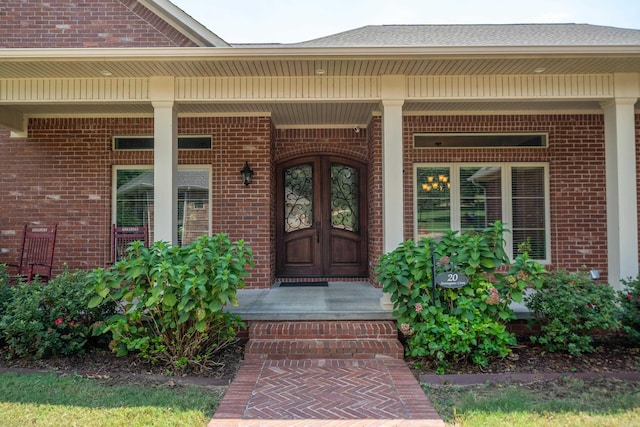 20 Stonegate, Hot Springs, AR 71913 - doorway to property featuring brick siding and covered porch