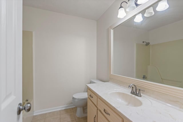 51 Fieldcrest Cir, Cabot, AR 72086 - bathroom featuring toilet, tile patterned flooring, vanity, baseboards, and a shower