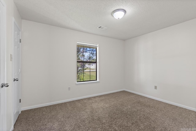 51 Fieldcrest Cir, Cabot, AR 72086 - spare room with a textured ceiling, carpet floors, and baseboards
