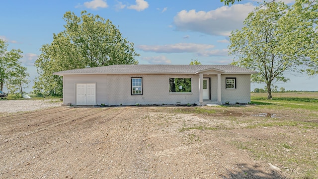 ranch-style home with brick siding