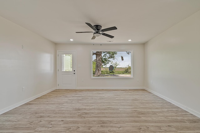 unfurnished room with light wood-style flooring, recessed lighting, ceiling fan, and baseboards