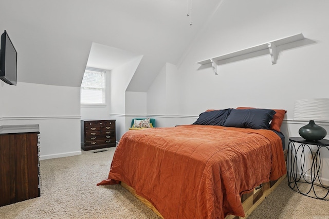4911 B St, Little Rock, AR 72205 - carpeted bedroom with vaulted ceiling and baseboards