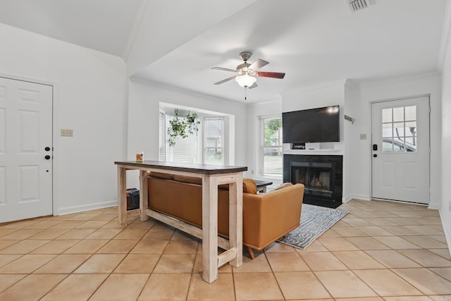 4911 B St, Little Rock, AR 72205 - living room with a fireplace, light tile patterned floors, ceiling fan, ornamental molding, and baseboards