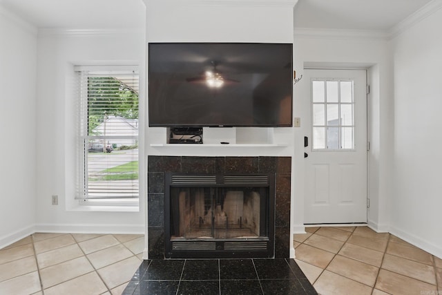 4911 B St, Little Rock, AR 72205 - detailed view of crown molding, a fireplace, ceiling fan, and baseboards
