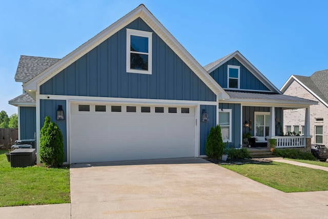 5101 Peace Ln, Alexander, AR 72002 - view of front facade featuring board and batten siding, covered porch, driveway, roof with shingles, and an attached garage