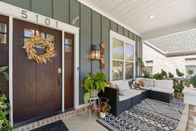 5101 Peace Ln, Alexander, AR 72002 - entrance to property featuring board and batten siding, a porch, and an outdoor living space