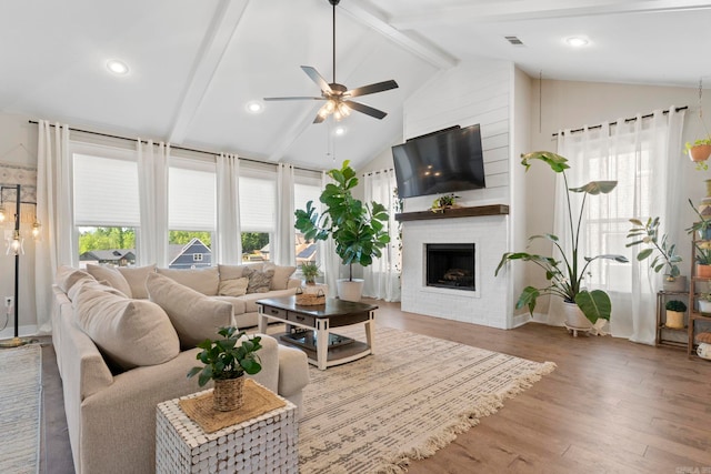 5101 Peace Ln, Alexander, AR 72002 - living room with a ceiling fan, a fireplace, and wood finished floors