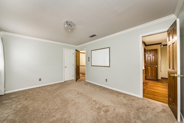 5401 N Hills Blvd, North Little Rock, AR 72116 - unfurnished bedroom with ornamental molding, carpet, and baseboards