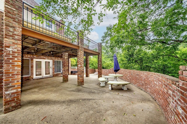 5401 N Hills Blvd, North Little Rock, AR 72116 - view of patio with french doors and a balcony