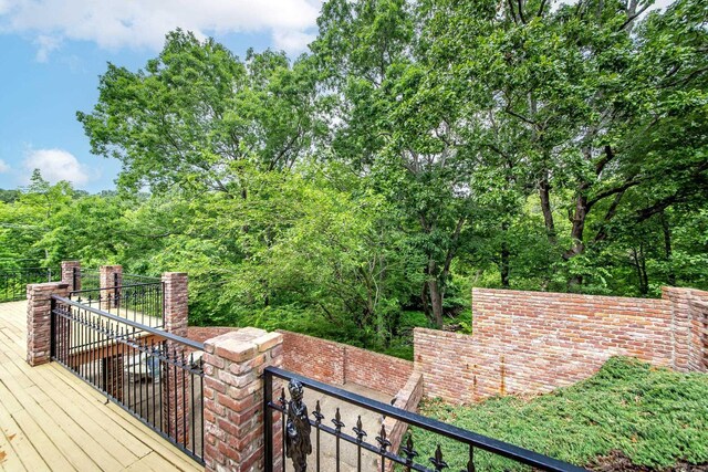 5401 N Hills Blvd, North Little Rock, AR 72116 - wooden terrace featuring fence