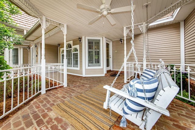 5401 N Hills Blvd, North Little Rock, AR 72116 - wooden terrace featuring ceiling fan and covered porch