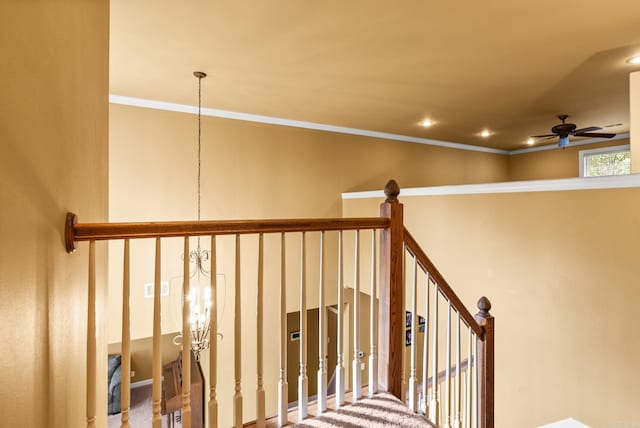 121 Lily Dr, Maumelle, AR 72113 - stairs with ceiling fan, crown molding, and recessed lighting