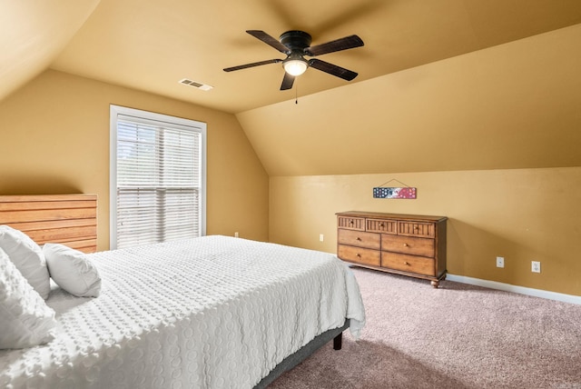 121 Lily Dr, Maumelle, AR 72113 - carpeted bedroom featuring vaulted ceiling, baseboards, and a ceiling fan