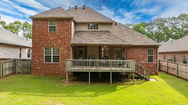 121 Lily Dr, Maumelle, AR 72113 - back of house featuring a shingled roof, a deck, and brick siding
