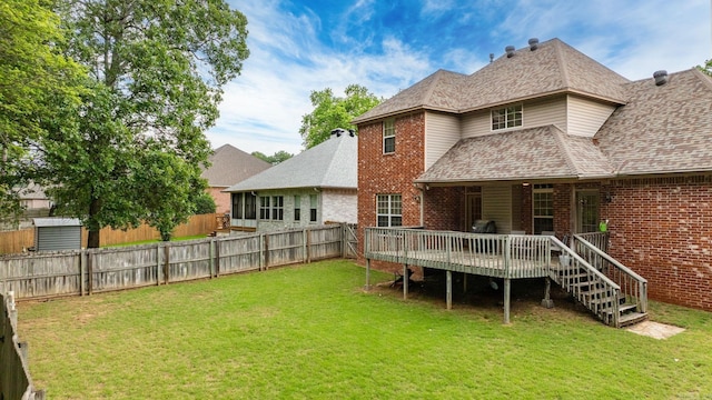 121 Lily Dr, Maumelle, AR 72113 - rear view of property featuring brick siding, a deck, and roof with shingles