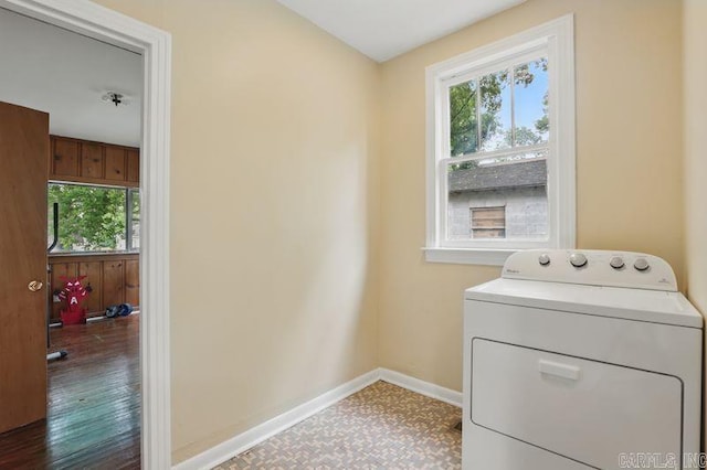 201 E 21st St, Little Rock, AR 72206 - clothes washing area with washer / clothes dryer, healthy amount of natural light, and baseboards