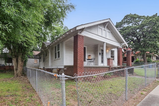 201 E 21st St, Little Rock, AR 72206 - bungalow-style home featuring covered porch and brick siding