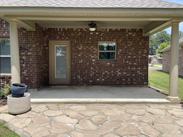 view of patio featuring a ceiling fan