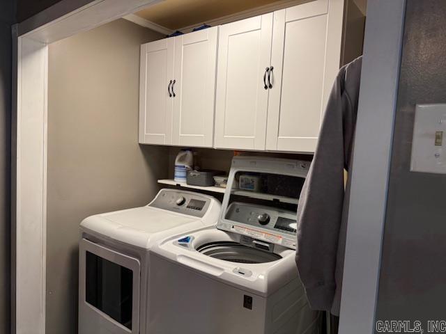 21 Emma Dr, Pocahontas, AR 72455 - laundry room with independent washer and dryer and cabinet space