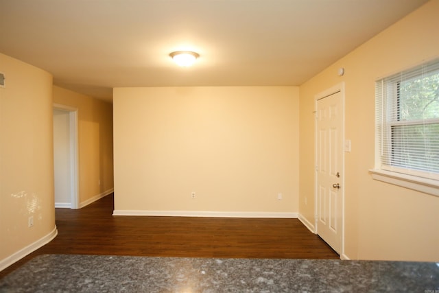 6914 Juniper Rd, Little Rock, AR 72209 - empty room with dark wood finished floors and baseboards