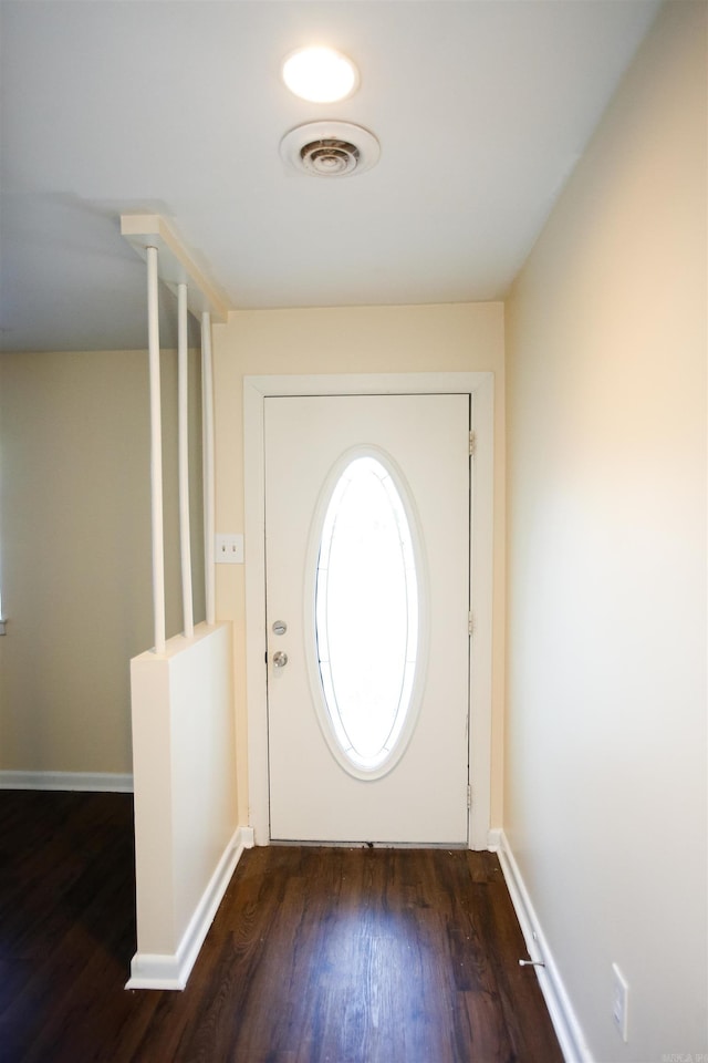 6914 Juniper Rd, Little Rock, AR 72209 - entryway with dark wood-style flooring and baseboards