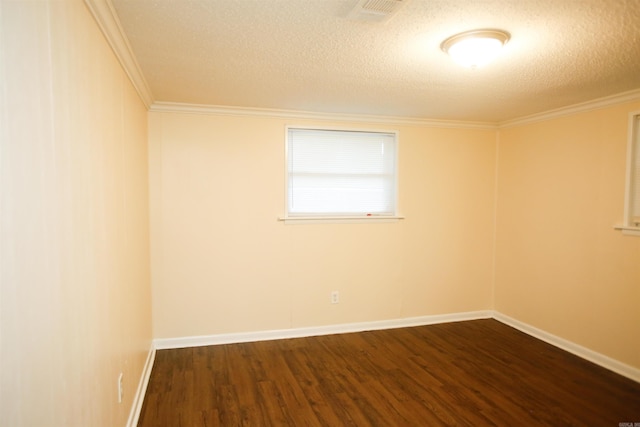 6914 Juniper Rd, Little Rock, AR 72209 - empty room with dark wood-style floors, a textured ceiling, ornamental molding, and baseboards