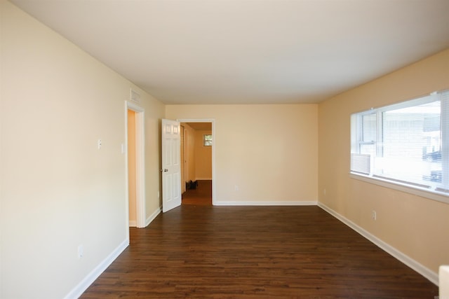 6914 Juniper Rd, Little Rock, AR 72209 - spare room featuring dark wood finished floors and baseboards