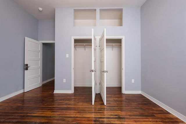 1407 Hanger St, Little Rock, AR 72202 - unfurnished bedroom with wood finished floors and baseboards