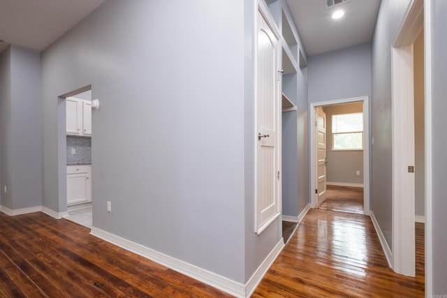 1407 Hanger St, Little Rock, AR 72202 - corridor featuring hardwood / wood-style floors and baseboards
