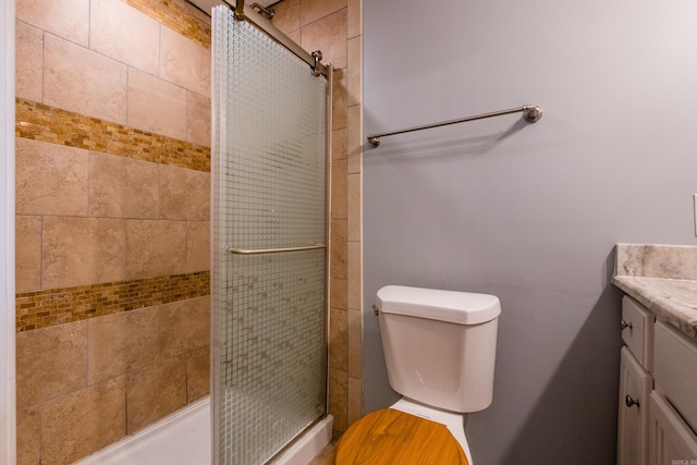 1407 Hanger St, Little Rock, AR 72202 - full bathroom with a stall shower, vanity, and toilet
