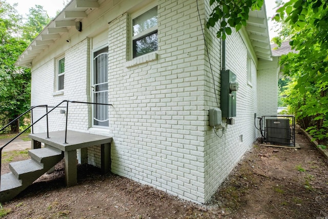 1407 Hanger St, Little Rock, AR 72202 - view of home's exterior with brick siding and cooling unit