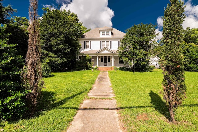 344 S Main St, Monticello, AR 71655 - american foursquare style home featuring a front yard