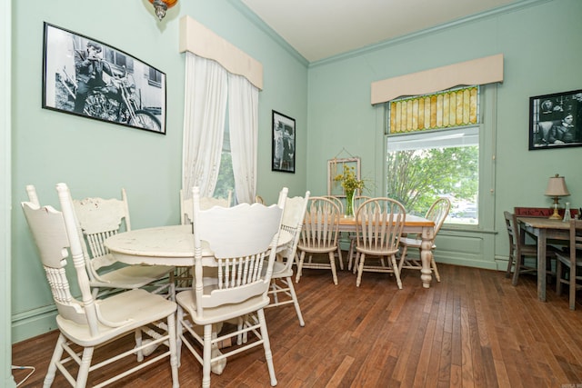 344 S Main St, Monticello, AR 71655 - dining room featuring crown molding, hardwood / wood-style floors, and healthy amount of natural light