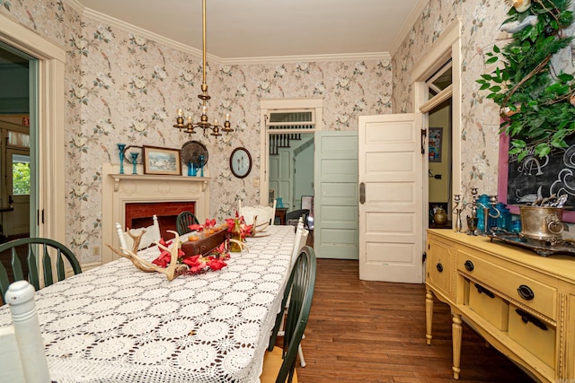 344 S Main St, Monticello, AR 71655 - dining room featuring wallpapered walls, dark wood-style floors, and ornamental molding